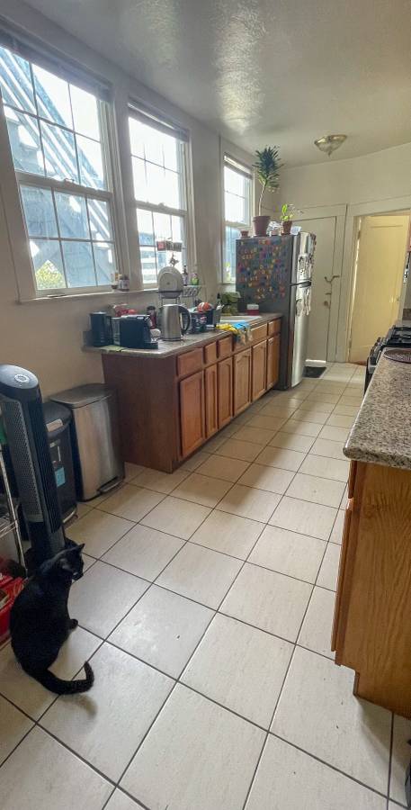 Before: messy kitchen listing photo