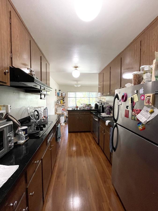 Before: cluttered galley kitchen