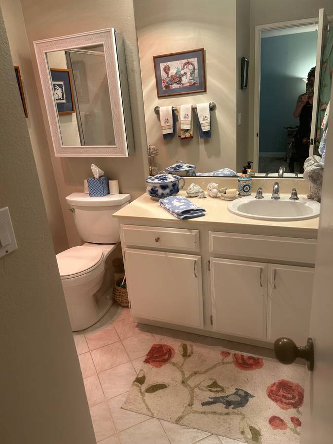 Before: busy decorated bathroom